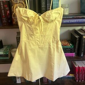 Babyboo lemon yellow Lacey mini dress size small, never worn